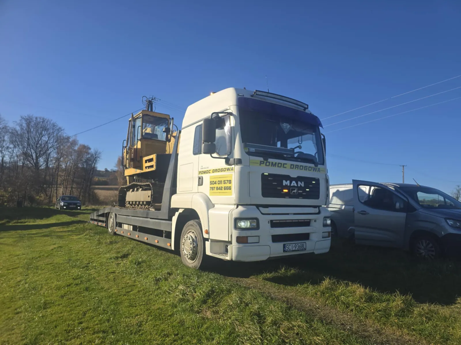 Transport koparki samochodem niskopodwoziowym DM Multiservice